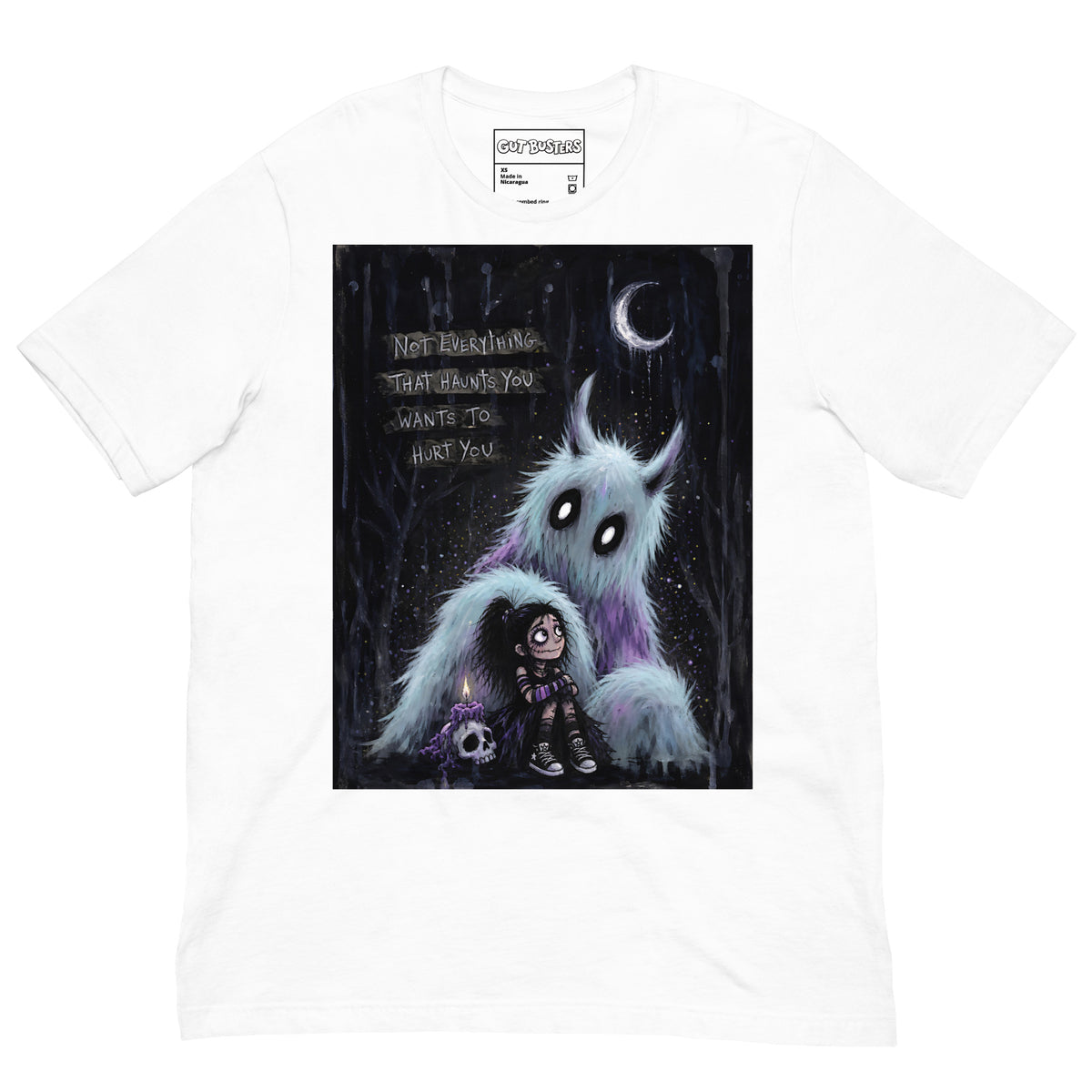 White unisex t-shirt with the 'The Haunted' goth graphic: a little goth girl holding a candle beside a fuzzy blue monster under a crescent moon, with the words "Not everything that haunts you wants to hurt you"