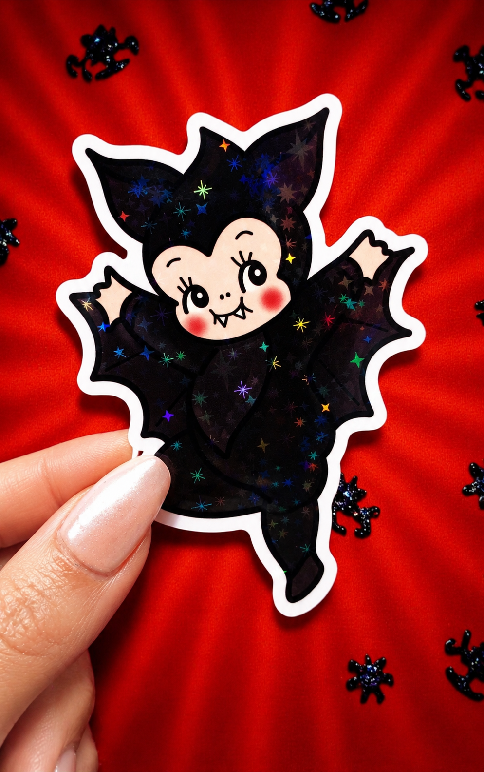 Funny Vampire bat sticker, black bat with pale face and colorful star sparkles, white outline