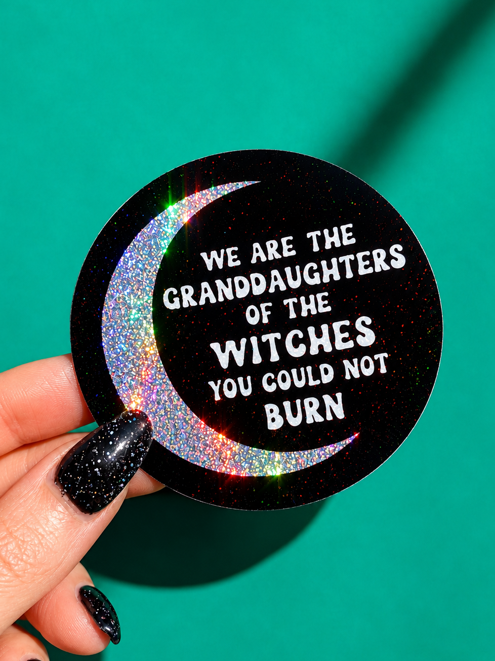Funny Halloween witch quote sticker, round black design with glittery rainbow border