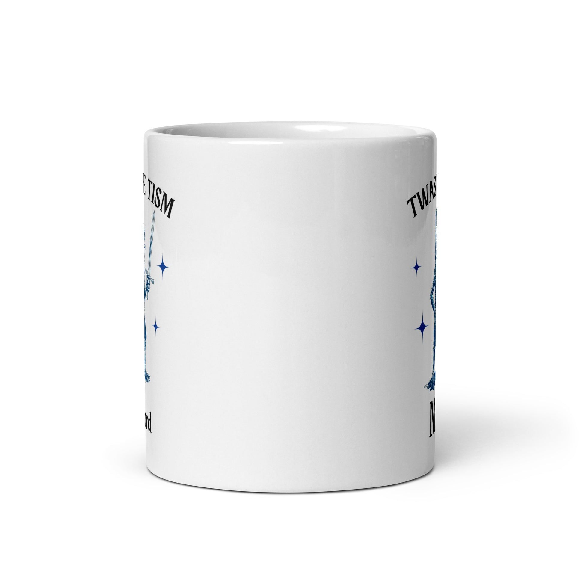 White glossy mug back with partial blue stars and 'Twas the Tism' text