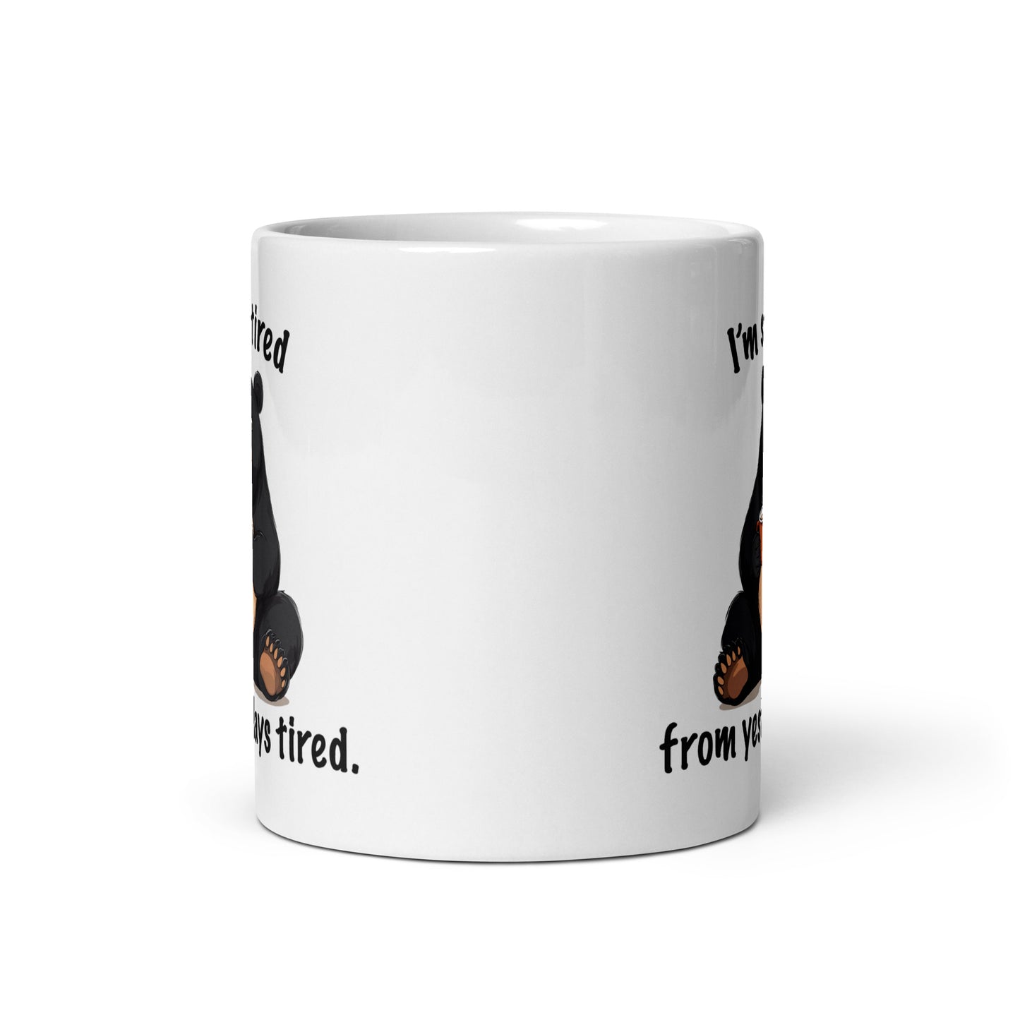 White mug back view with partial bear paws and “from yesterdays tired” text