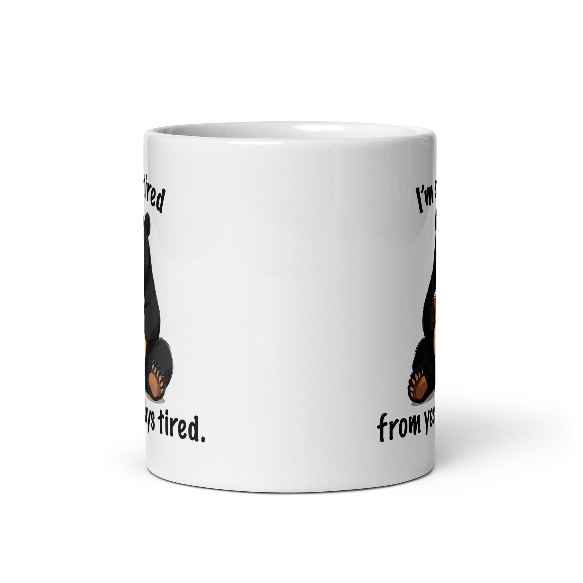 White mug back view with partial bear paws and “from yesterdays tired” text