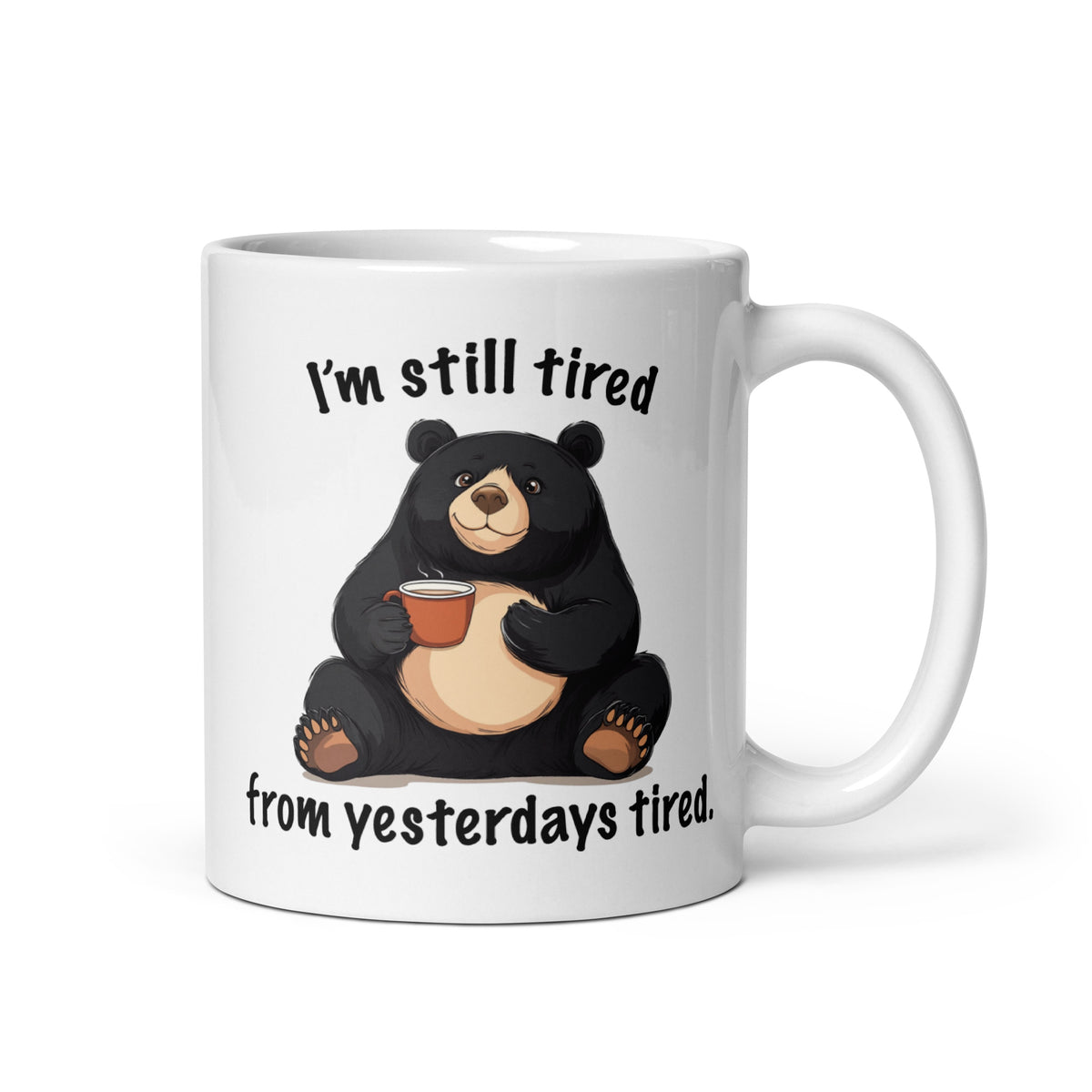 White mug with bear holding coffee, “I'm still tired” and “from yesterdays tired”
