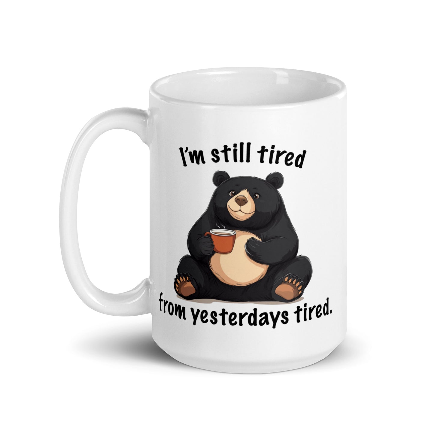 White mug with centered bear holding coffee and “I'm still tired” lettering
