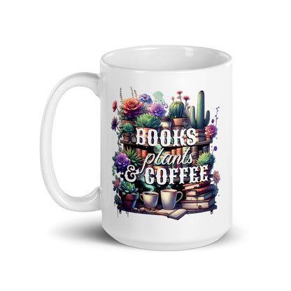 White glossy mug 3/4 view with “BOOKS plants & COFFEE” floral cactus and books graphic