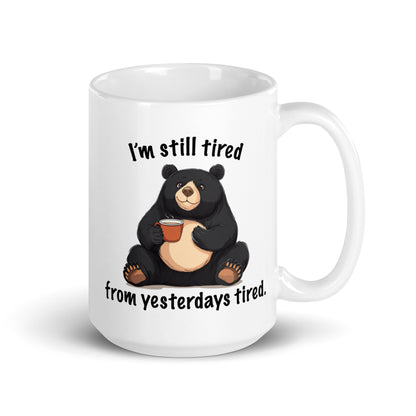 White glossy mug with bear holding coffee cup and “from yesterdays tired” text
