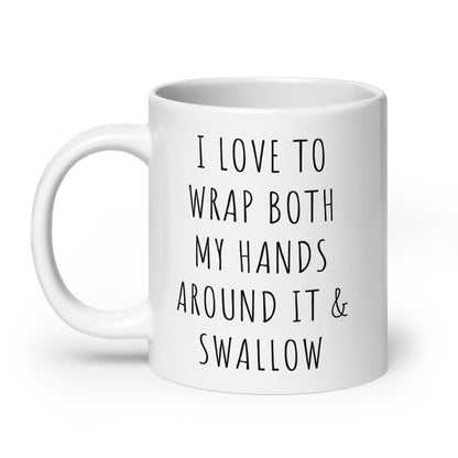 White glossy ceramic mug with black quote: I LOVE TO WRAP BOTH MY HANDS