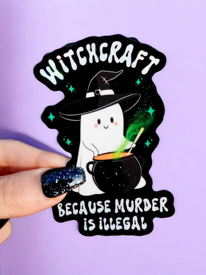 Funny Black Halloween sticker of smiling witch with green potion, text 'Witchcraft' 'Murder Is Illegal'
