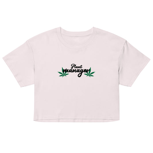 Women’s pale pink crop top with “Plant Manager” plant graphic on front