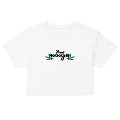 Women’s white crop top with “Plant Manager” plant graphic on front