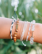 Stack of Elevated Faith Christian Jewelry Bracelets with natural stones and a charm for spiritual expression